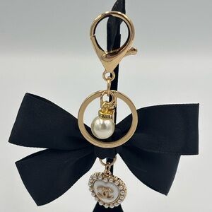 SOLD CC black keychain with pearl and bow